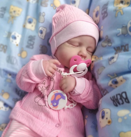 Realistisk nyfödd babydocka