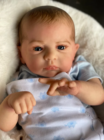 Realistisk nyfödd babydocka i blöjor